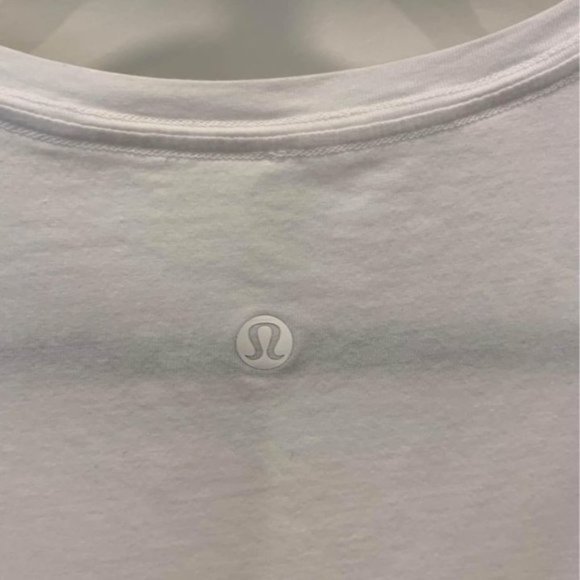 Lululemon lightweight white tank top. Crew neck. Size 6. Hem notch. - Picture 5 of 6